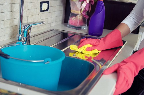 Routine sofa cleaning and cushion care in a modern home